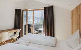 Einige der Zimmer sind mit Balkon oder Terrasse ausgestattet - Beispiel Deluxe-Zimmer.